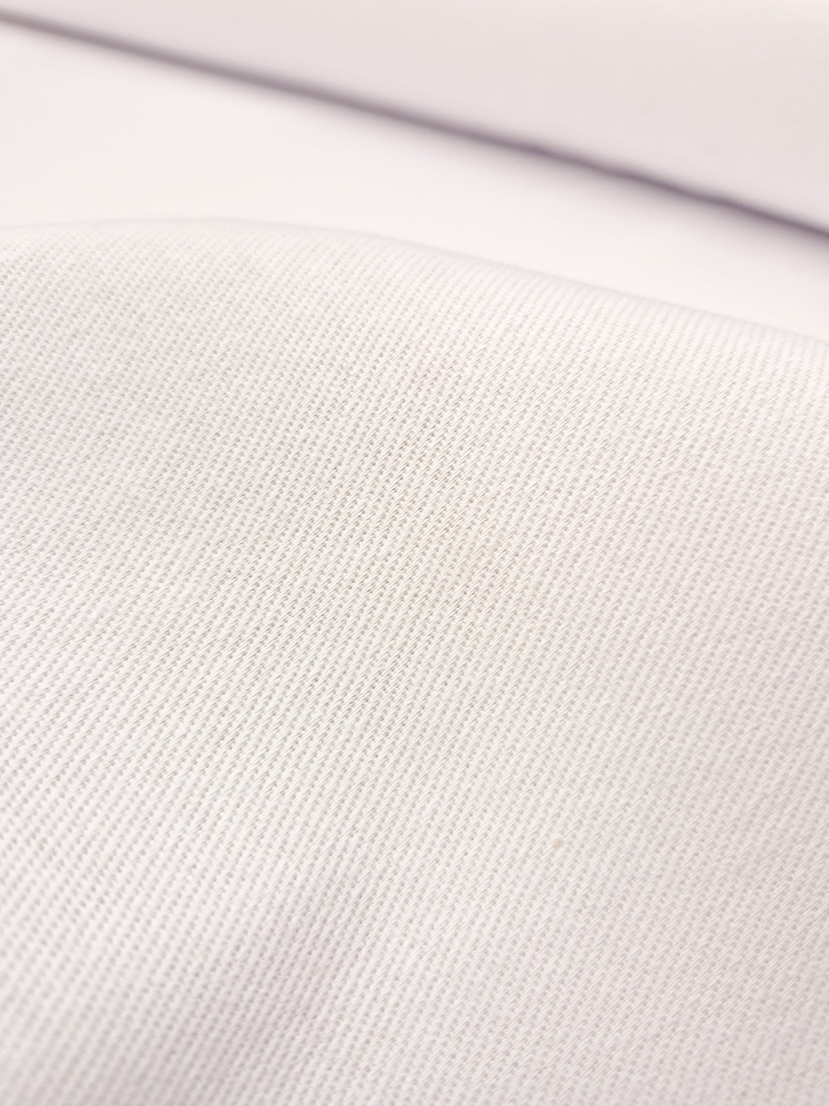 Close up of white twill
