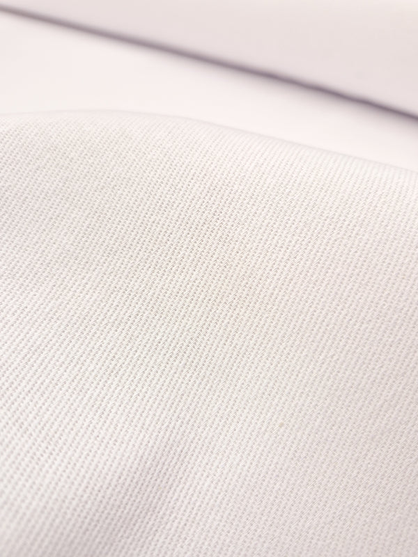 Close up of white twill